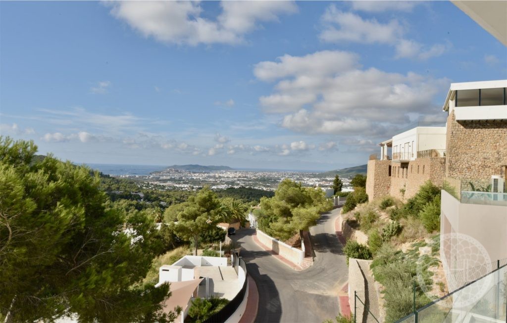 Wonderful modern villa in private residence with commanding views to Ibiza town and the sea